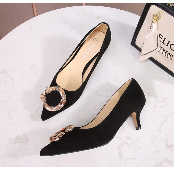 Black low heel covered shoe