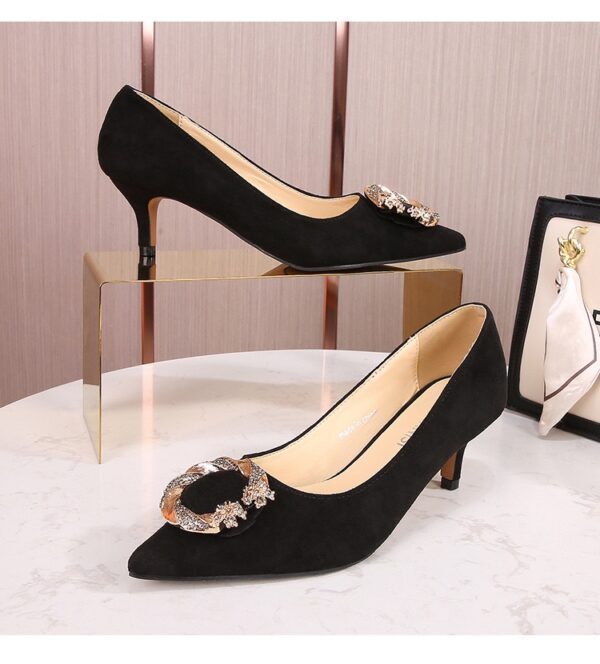 Black low heel covered shoe