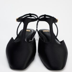 Black Charm T-Strap Flat Shoe