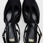 Black Charm T-Strap Flat Shoe