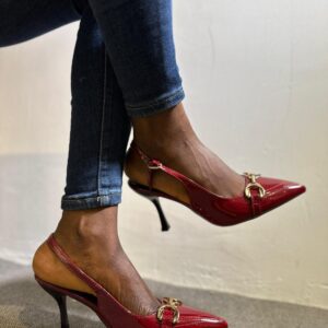 Make a bold impression with this High Red Slingback, featuring a vibrant red hue and a sleek, elegant design. Confident, stylish, and perfect for standing out effortlessly.