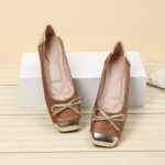Step out in style with this Flat Brown and Gold Cover Shoe, featuring a warm brown tone paired with a hint of gold for a touch of elegance. Comfortable, chic, and perfect for any occasion. Runs normal for slim feet, wide and full feet can take a size higher.