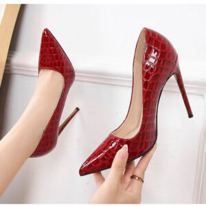 The High Red Cover Shoe makes a bold and elegant statement with its striking red finish and refined full coverage design.