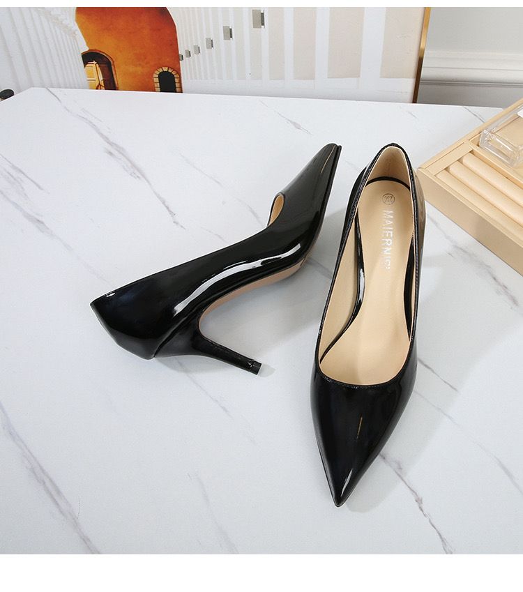 The Mid Black Cover Shoe delivers timeless elegance with a comfortable mid heel and a sleek full coverage design. Perfect for work, formal events, or everyday polished looks.