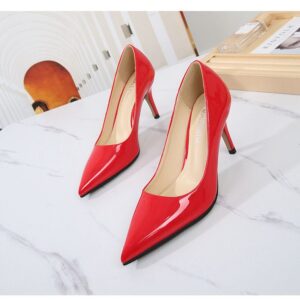 The Low Red Cover Shoe adds a bold yet elegant touch to your everyday style. Featuring a sleek full coverage design and a comfortable low heel.